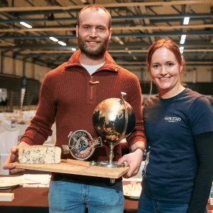 Ole and Maren Gangstad, the owners of Gangstad Gårdsysteri holding the World Champion Cheese, Nidelven Blå