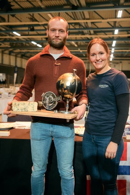 Ole and Maren Gangstad, the owners of Gangstad Gårdsysteri holding the World Champion Cheese, Nidelven Blå