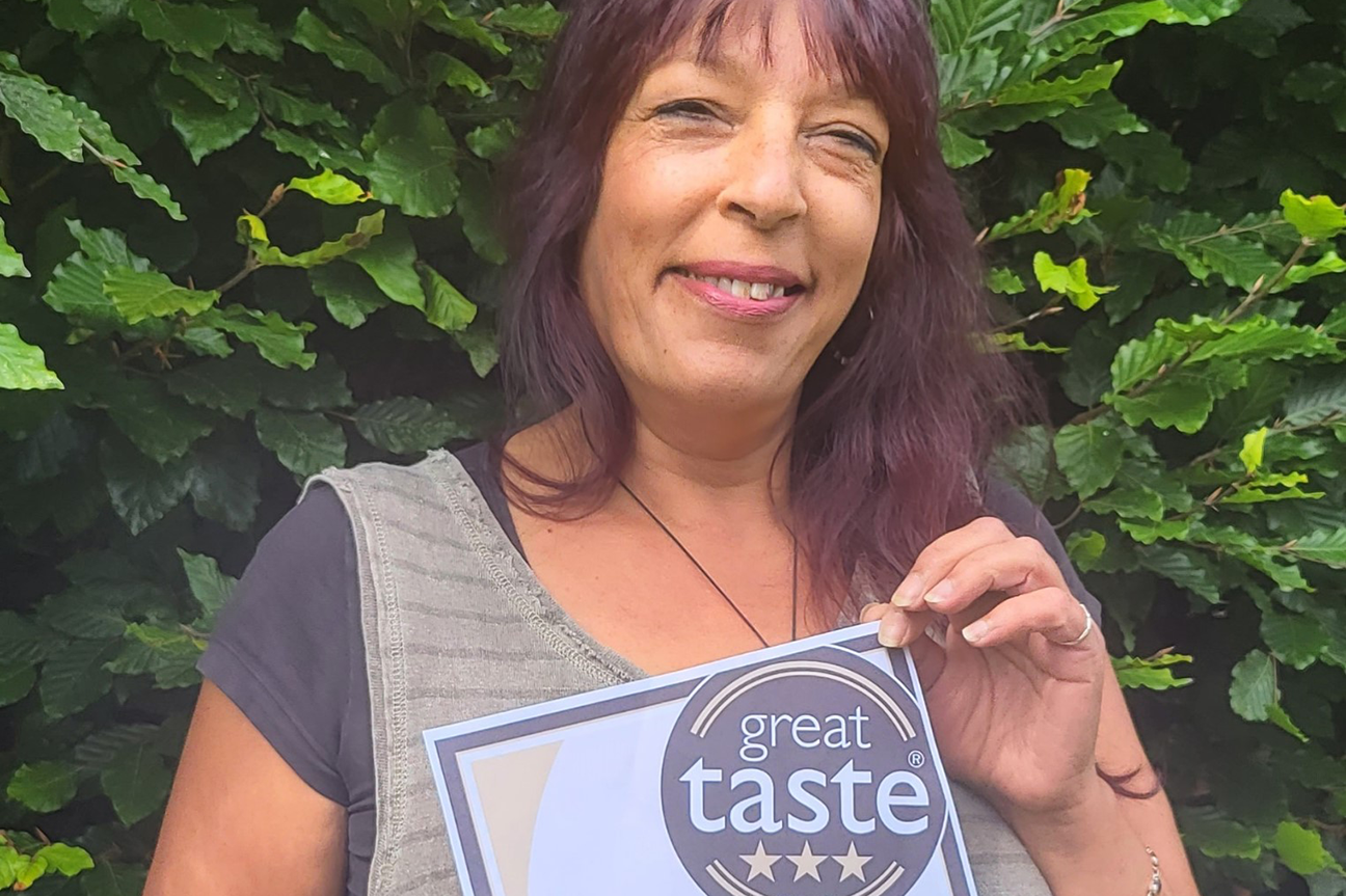 Karobi with her 3-star certificate from Great Taste 2023