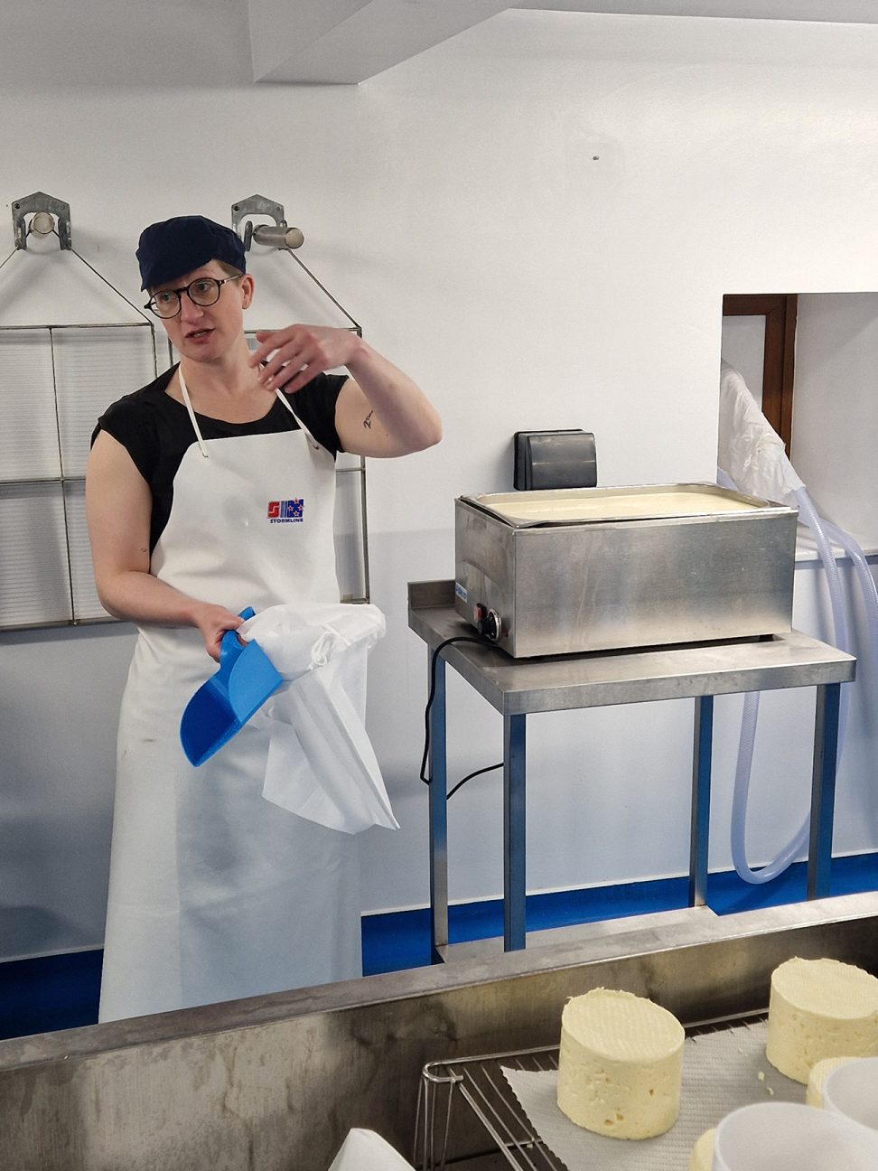 Katy Fenwick teaching at the Courtyard Dairy's cheese making room