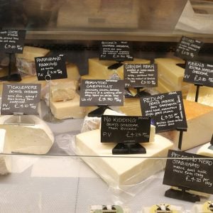 Lead Tanya Barrow on Unsplash - Cheese counter